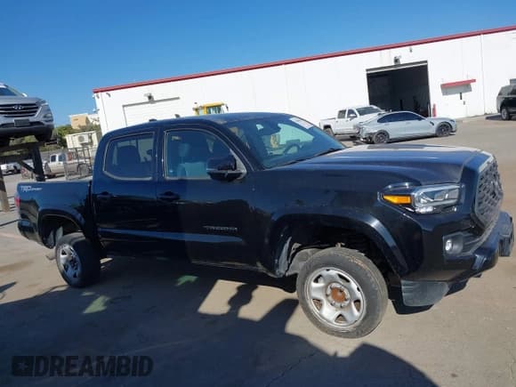 ✅ 2022 Toyota Tacoma SR5 • VIN: 3TMAZ5CN4NM167187 • Лот: 42683051. Опубликован ранее на IAAI с пробегом 50 865 миль. Бесплатный доступ к архиву аукционных продаж из США и подробный отчёт об истории автомобиля на DreamBid. Изображение 13.