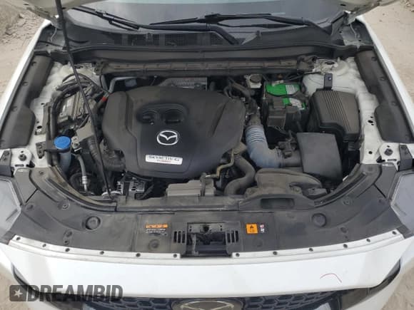 ✅ 2022 Mazda CX-5 2.5 Turbo • VIN: JM3KFBAY7N0604926 • Lot: 86640415. Listed on Copart with 31,096 mi. Free auction sales archive from the USA and detailed vehicle history report at DreamBid. Image 12.