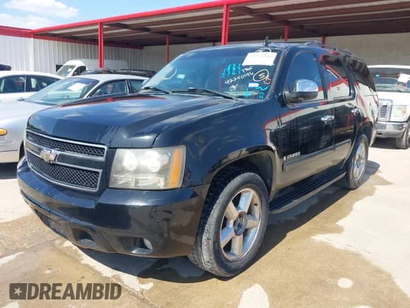 2008 Chevrolet Tahoe 2LT with VIN 1GNFC13098R136161, listed as a IAAI auction lot 42250146 with 328,795 mi miles and . Bid and sale history available at DreamBid. Image 2.
