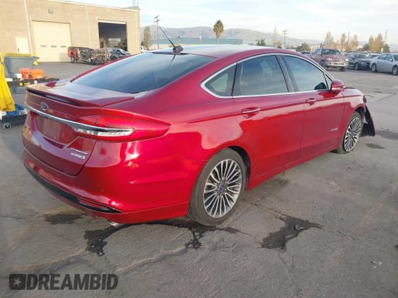 ✅ 2017 Ford Fusion Hybrid Titanium • VIN: 3FA6P0RU8HR277590 • Lot: 43668115. Listed on IAAI with Not provided. Free auction sales archive from the USA and detailed vehicle history report at DreamBid. Image 4.