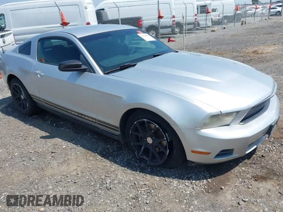 ✅ 2012 Ford Mustang V6 • VIN: 1ZVBP8AM4C5234747 • Lot: 43123966. Listed on IAAI with 196,457 mi. Free auction sales archive from the USA and detailed vehicle history report at DreamBid. Image 1.