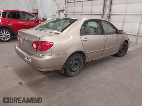 ✅ 2007 Toyota Corolla CE • VIN: 1NXBR32EX7Z810629 • Lot: 42353605. Listed on IAAI with 299,999 mi. Free auction sales archive from the USA and detailed vehicle history report at DreamBid. Image 4.