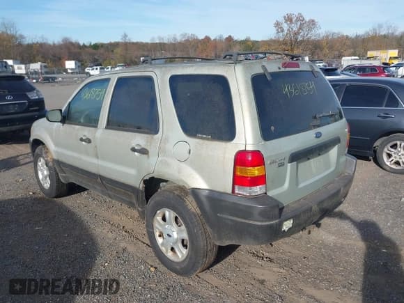 ✅ 2003 Ford Escape XLT Popular 2 • VIN: 1FMYU93173KC66300 • Лот: 43618754. Опубликован ранее на IAAI с пробегом 194 762 миль. Бесплатный доступ к архиву аукционных продаж из США и подробный отчёт об истории автомобиля на DreamBid. Изображение 3.