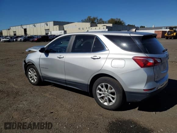 ✅ 2021 Chevrolet Equinox LT • VIN: 3GNAXUEV1MS124909 • Lot: 85860995. Listed on Copart with 88,479 mi. Free auction sales archive from the USA and detailed vehicle history report at DreamBid. Image 2.