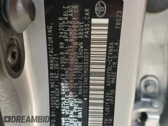 2021 Toyota Camry Hybrid LE with VIN 4T1C31AK7MU562031, listed as a Copart auction lot 71506375 with 82,877 mi miles and Salvage title. Bid and sale history available at DreamBid. Image 12.