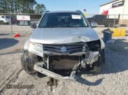 ✅ 2013 Suzuki Grand Vitara Limited • VIN: JS3TE0D74D4100091 • Lot: 41684748. Listed on IAAI with 176,696 mi. Free auction sales archive from the USA and detailed vehicle history report at DreamBid. Image 13.