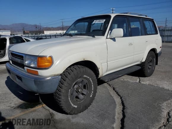 ✅ 1991 Toyota Land Cruiser • VIN: JT3FJ80W0M0022407 • Lot: 85136025. Listed on Copart with 218,871 mi. Free auction sales archive from the USA and detailed vehicle history report at DreamBid. Image 1.