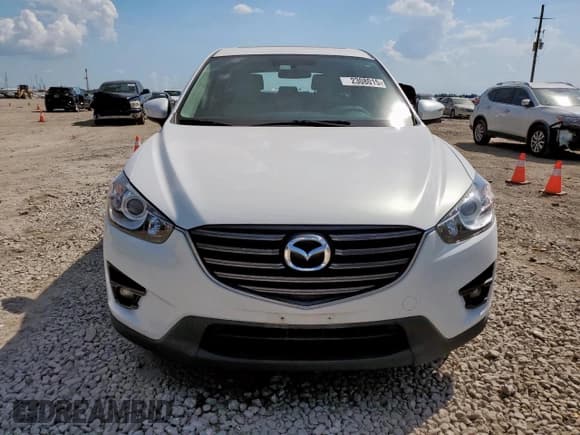 ✅ 2016 Mazda CX-5 Grand Touring • VIN: JM3KE2DY8G0917775 • Lot: 82308015. Wystawiony na Copart z przebiegiem 108 455 mil. Bezpłatny archiwum sprzedaży aukcyjnych z USA i szczegółowy raport historii pojazdu na DreamBid. Zdjęcie 5.