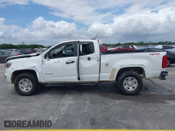 ✅ 2015 Chevrolet Colorado 4WD WT • VIN: 1GCHTAEAXF1204857 • Лот: 42005800. Опубликован ранее на IAAI с пробегом 100 378 миль. Бесплатный доступ к архиву аукционных продаж из США и подробный отчёт об истории автомобиля на DreamBid. Изображение 14.