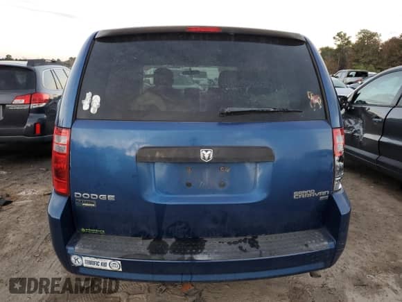 2010 Dodge Grand Caravan SE with VIN 2D4RN4DE4AR379925, listed as a Copart auction lot 84399754 with 198,603 mi miles and Salvage title. Bid and sale history available at DreamBid. Image 6.