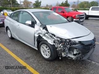 ✅ 2021 Toyota Prius XLE • VIN: JTDKAMFP6M3193003 • Lot: 43763978. Listed on IAAI with 29,849 mi. Free auction sales archive from the USA and detailed vehicle history report at DreamBid. Image 1.