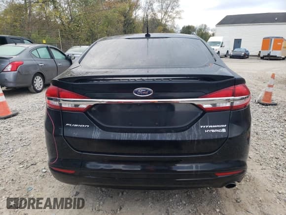 ✅ 2017 Ford Fusion Hybrid Titanium • VIN: 3FA6P0RU7HR278472 • Lot: 82434245. Wystawiony na Copart z przebiegiem 144 287 mil. Bezpłatny archiwum sprzedaży aukcyjnych z USA i szczegółowy raport historii pojazdu na DreamBid. Zdjęcie 6.