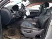 ✅ 2013 Volkswagen Touareg Exec • VIN: WVGEF9BP6DD011274 • Lot: 50680105. Listed on Copart with 96,336 mi. Free auction sales archive from the USA and detailed vehicle history report at DreamBid. Image 7.