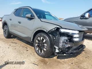 ✅ 2025 Hyundai Santa Cruz SEL • VIN: 5NTJB4DE2SH137301 • Лот: 43118934. Опубликован ранее на IAAI с пробегом 14 294 миль. Бесплатный доступ к архиву аукционных продаж из США и подробный отчёт об истории автомобиля на DreamBid. Изображение 1.