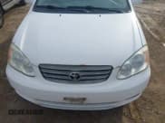 ✅ 2003 Toyota Corolla CE • VIN: 2T1BR32E93C139983 • Lot: 43602701. Listed on IAAI with 257,130 mi. Free auction sales archive from the USA and detailed vehicle history report at DreamBid. Image 6.