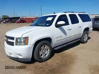 2014 Chevrolet Suburban LT z VIN 1GNSCJE0XER245963, wystawiony jako IAAI lot #43110230 z przebiegiem 160 648 mil mil oraz . Historia ofert i sprzedaży dostępna na DreamBid. Obrazek 2.