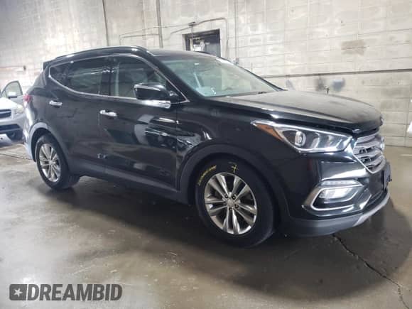 2017 Hyundai Santa Fe 2.0T z VIN 5XYZUDLA2HG435261, wystawiony jako Copart lot #68190485 z przebiegiem 125 513 mil mil oraz Szkoda całkowita • Salvage title. Historia ofert i sprzedaży dostępna na DreamBid. Obrazek 4.