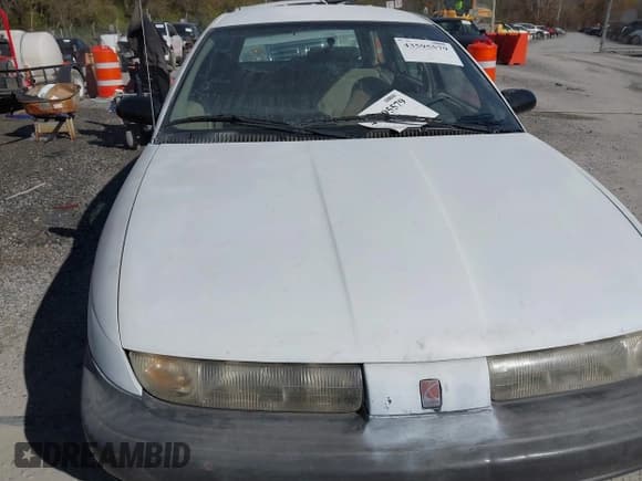 ✅ 1997 Saturn SW • VIN: 1G8ZH8284VZ234897 • Lot: 43595579. Listed on IAAI with 260,909 mi. Free auction sales archive from the USA and detailed vehicle history report at DreamBid. Image 6.