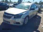 ✅ 2014 Chevrolet Cruze LS • VIN: 1G1PA5SH6E7165344 • Lot: 43513826. Listed on IAAI with 64,739 mi. Free auction sales archive from the USA and detailed vehicle history report at DreamBid. Image 2.