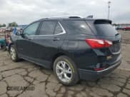 ✅ 2021 Chevrolet Equinox Premier • VIN: 2GNAXXEVXM6159397 • Lot: 82042275. Wystawiony na Copart z przebiegiem 57 213 mil. Bezpłatny archiwum sprzedaży aukcyjnych z USA i szczegółowy raport historii pojazdu na DreamBid. Zdjęcie 2.