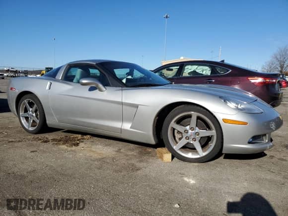 2005 Chevrolet Corvette with VIN 1G1YY24UX55112599, listed as a Copart auction lot 83626114 with 22,547 mi miles and Salvage title. Bid and sale history available at DreamBid. Image 4.