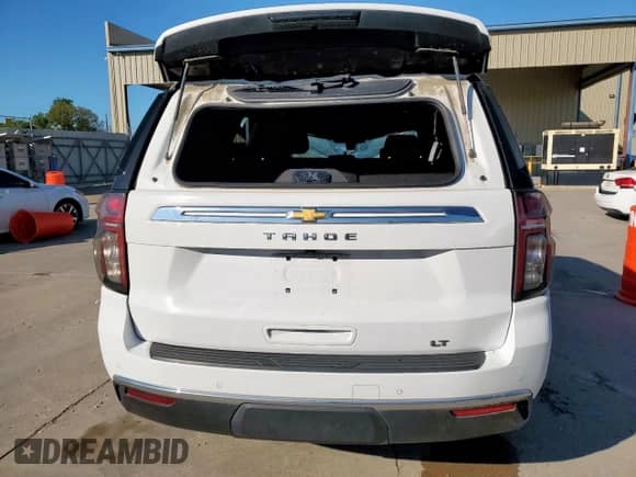 2022 Chevrolet Tahoe LT z VIN 1GNSKNKD1NR157742, wystawiony jako Copart lot #71324675 z przebiegiem 51 272 mil mil oraz Szkoda całkowita • Salvage title. Historia ofert i sprzedaży dostępna na DreamBid. Obrazek 6.