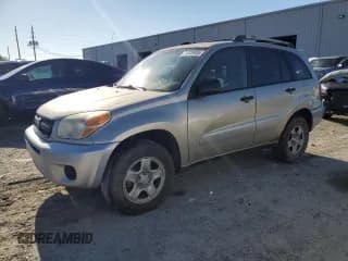 ✅ 2004 Toyota RAV4 • VIN: JTEGD20V740033136 • Лот: 71028935. Опубликован ранее на Copart с пробегом 162 708 миль. Бесплатный доступ к архиву аукционных продаж из США и подробный отчёт об истории автомобиля на DreamBid. Изображение 1.