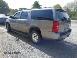 2011 Chevrolet Suburban LT z VIN 1GNSCJE09BR344091, wystawiony jako IAAI lot #43487649 z przebiegiem 182 652 mil mil oraz . Historia ofert i sprzedaży dostępna na DreamBid. Obrazek 3.