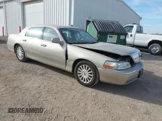 ✅ 2004 Lincoln Town Car Signature • VIN: 1LNHM81WX4Y676953 • Lot: 43634319. Listed on IAAI with 94,312 mi. Free auction sales archive from the USA and detailed vehicle history report at DreamBid. Image 1.