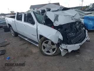 2013 Chevrolet Silverado 2500HD LTZ with VIN 1GC1KYEG0DF218297, listed as a IAAI auction lot 41883234 with Not provided miles and . Bid and sale history available at DreamBid. Image 1.