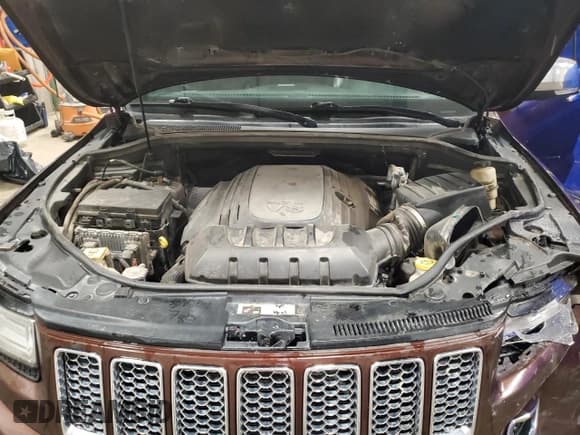 ✅ 2014 Jeep Grand Cherokee Summit • VIN: 1C4RJFJT6EC276110 • Lot: 90085555. Listed on Copart with 266,904 mi. Free auction sales archive from the USA and detailed vehicle history report at DreamBid. Image 12.