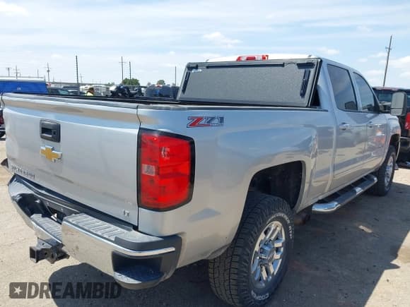 ✅ 2015 Chevrolet Silverado 2500HD LT • VIN: 1GC1KVEG7FF501135 • Lot: 42374401. Listed on IAAI with 135,855 mi. Free auction sales archive from the USA and detailed vehicle history report at DreamBid. Image 4.