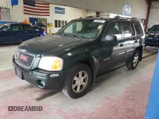 ✅ 2004 GMC Envoy SLE • VIN: 1GKDT13S342140960 • Lot: 68049835. Listed on Copart with 287,399 mi. Free auction sales archive from the USA and detailed vehicle history report at DreamBid. Image 1.