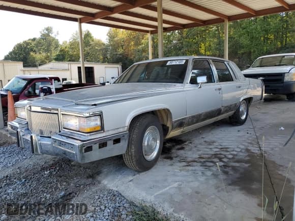 ✅ 1991 Cadillac Brougham • VIN: 1G6DW54E8MR726678 • Lot: 80712105. Listed on Copart with 170,748 mi. Free auction sales archive from the USA and detailed vehicle history report at DreamBid. Image 1.