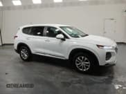 ✅ 2020 Hyundai Santa Fe SE • VIN: 5NMS23AD6LH245329 • Lot: 93103785. Wystawiony na Copart z przebiegiem 156 064 mil. Bezpłatny archiwum sprzedaży aukcyjnych z USA i szczegółowy raport historii pojazdu na DreamBid. Zdjęcie 4.