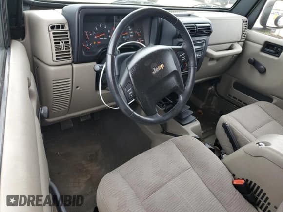 ✅ 2004 Jeep Wrangler Rubicon • VIN: 1J4FA69S34P756394 • Lot: 86123855. Wystawiony na Copart z przebiegiem 62 500 mil. Bezpłatny archiwum sprzedaży aukcyjnych z USA i szczegółowy raport historii pojazdu na DreamBid. Zdjęcie 8.