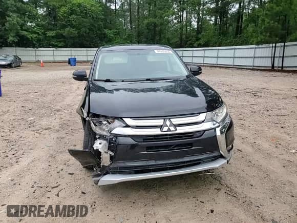 2018 Mitsubishi Outlander ES z VIN JA4AZ3A3XJZ013172, wystawiony jako Copart lot #60265055 z przebiegiem 137 660 mil mil oraz Szkoda całkowita • Salvage title. Historia ofert i sprzedaży dostępna na DreamBid. Obrazek 14.
