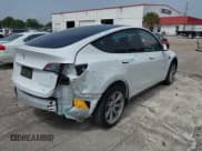 ✅ 2023 Tesla Model Y Long Range • VIN: 7SAYGDEE0PA065534 • Lot: 42445868. Listed on IAAI with 22,638 mi. Free auction sales archive from the USA and detailed vehicle history report at DreamBid. Image 20.