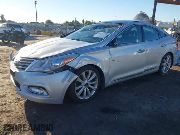 ✅ 2013 Hyundai Azera • VIN: KMHFH4JGXDA203110 • Лот: 41813088. Опубликован ранее на IAAI с пробегом 104 854 миль. Бесплатный доступ к архиву аукционных продаж из США и подробный отчёт об истории автомобиля на DreamBid. Изображение 2.