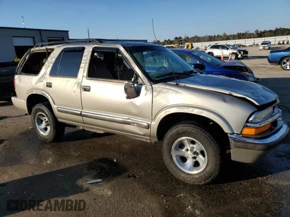2001 Chevrolet Blazer LS с VIN 1GNCS13W71K244416, выставлен на аукционе Copart как лот 77312694 с пробегом 194 740 миль миль и Списание • Salvage title. История ставок и продаж доступна на DreamBid. Изображение 4.