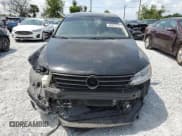 ✅ 2015 Volkswagen Jetta SE • VIN: 3VWD17AJ1FM238876 • Lot: 58957215. Listed on Copart with 122,705 mi. Free auction sales archive from the USA and detailed vehicle history report at DreamBid. Image 5.