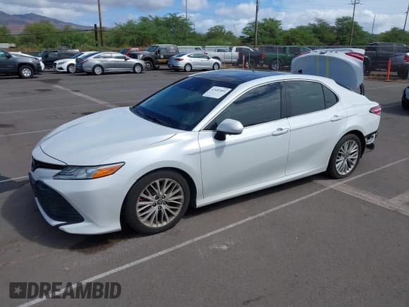 ✅ 2018 Toyota Camry LE • VIN: 4T1B11HK1JU047710 • Lot: 43482601. Listed on IAAI with 53,123 mi. Free auction sales archive from the USA and detailed vehicle history report at DreamBid. Image 2.