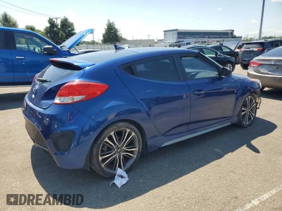 2016 Hyundai Veloster Turbo z VIN KMHTC6AE7GU276000, wystawiony jako Copart lot #69335545 z przebiegiem 106 188 mil mil oraz Czysty tytuł • Clean title. Historia ofert i sprzedaży dostępna na DreamBid. Obrazek 3.