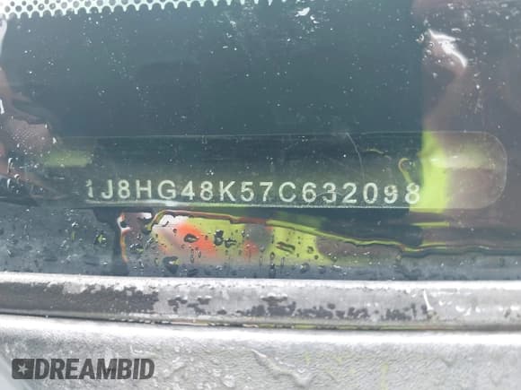 ✅ 2007 Jeep Commander Sport • VIN: 1J8HG48K57C632098 • Lot: 42300239. Wystawiony na IAAI z przebiegiem 311 738 mil. Bezpłatny archiwum sprzedaży aukcyjnych z USA i szczegółowy raport historii pojazdu na DreamBid. Zdjęcie 9.