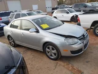 ✅ 2009 Volkswagen Jetta S • VIN: 3VWJM71KX9M097779 • Lot: 43749490. Listed on IAAI with 75,266 mi. Free auction sales archive from the USA and detailed vehicle history report at DreamBid. Image 1.