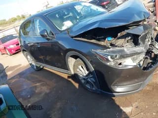 ✅ 2020 Mazda CX-5 Grand Touring • VIN: JM3KFADM9L0867211 • Lot: 43457671. Listed on IAAI with 71,034 mi. Free auction sales archive from the USA and detailed vehicle history report at DreamBid. Image 1.