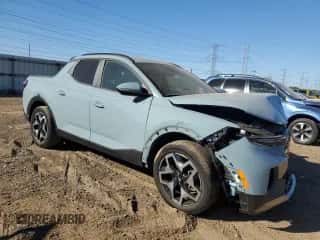 2023 Hyundai Santa Cruz Limited с VIN 5NTJEDAF4PH048079, выставлен на аукционе Copart как лот 76392004 с пробегом Не указан миль и Списание • Salvage title. История ставок и продаж доступна на DreamBid. Изображение 4.