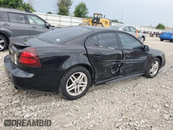 ✅ 2005 Pontiac Grand Prix GTP • VIN: 2G2WR524651347443 • Lot: 65758945. Listed on Copart with 145,104 mi. Free auction sales archive from the USA and detailed vehicle history report at DreamBid. Image 3.