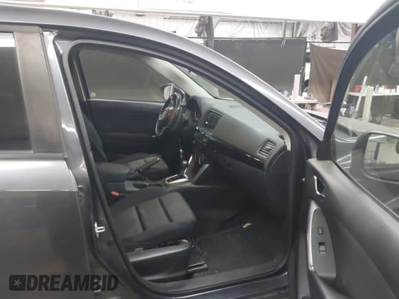 ✅ 2014 Mazda CX-5 Touring • VIN: JM3KE4CY0E0430130 • Lot: 43830898. Wystawiony na IAAI z przebiegiem 169 053 mil. Bezpłatny archiwum sprzedaży aukcyjnych z USA i szczegółowy raport historii pojazdu na DreamBid. Zdjęcie 5.