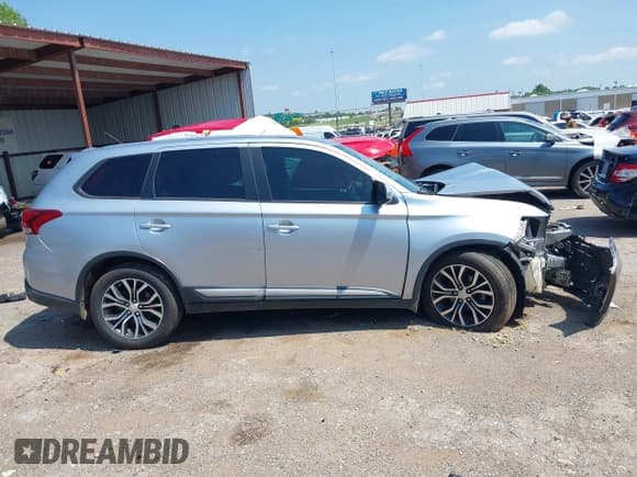 ✅ 2016 Mitsubishi Outlander SE • VIN: JA4AD3A35GZ007691 • Lot: 42365465. Listed on IAAI with Not provided. Free auction sales archive from the USA and detailed vehicle history report at DreamBid. Image 12.